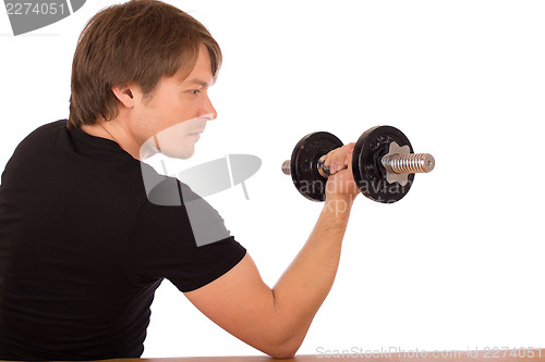 Image of Man make exercise with dumbbell