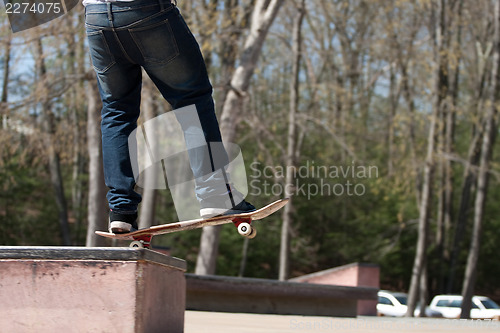 Image of Skateboarder on a Grind Rail