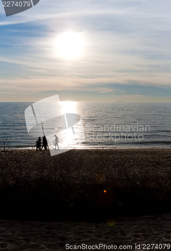 Image of Family Silhouette at the Beach