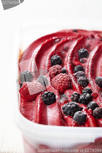 Image of Ice cream with fresh frozen berries
