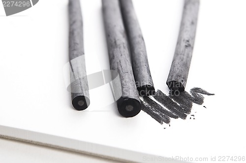 Image of Artist's black charcoal with smudge