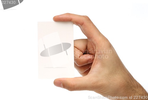 Image of Man holding a business card