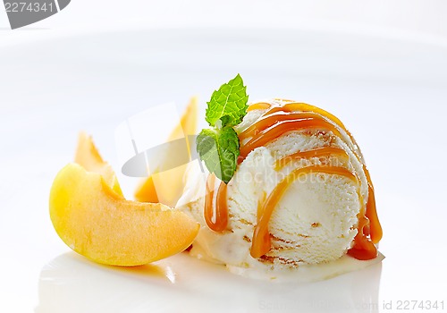 Image of scoop of ice cream on white plate