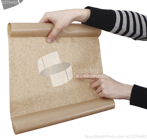 Image of Hand holdong a paper.