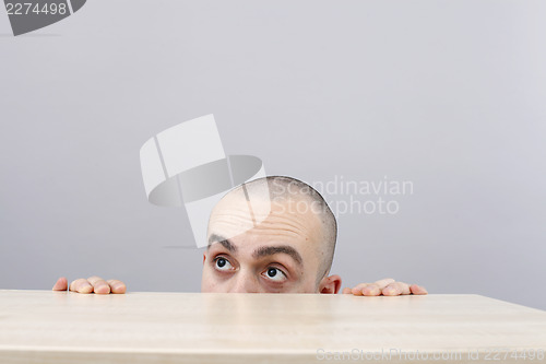 Image of Man at desk