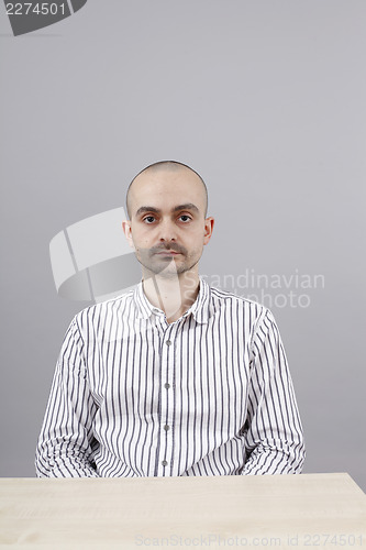 Image of Man at desk