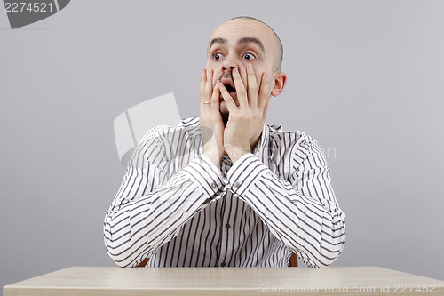 Image of Man at desk