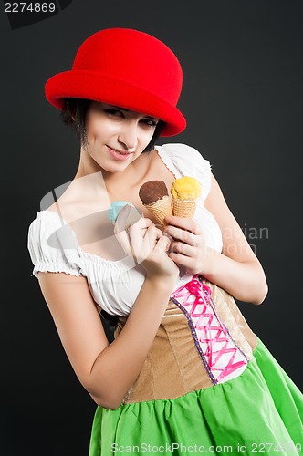 Image of Pretty girl in german style with ice cream