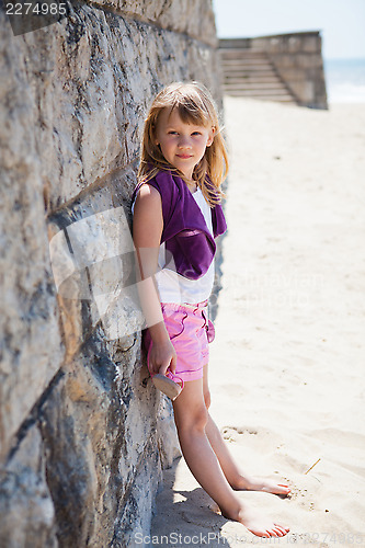 Image of Portrait of young girl at beach