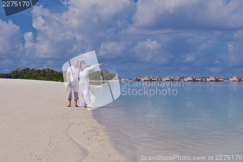 Image of happy young couple have fun on summer