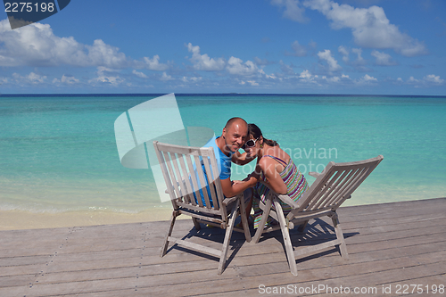 Image of happy young couple have fun on summer