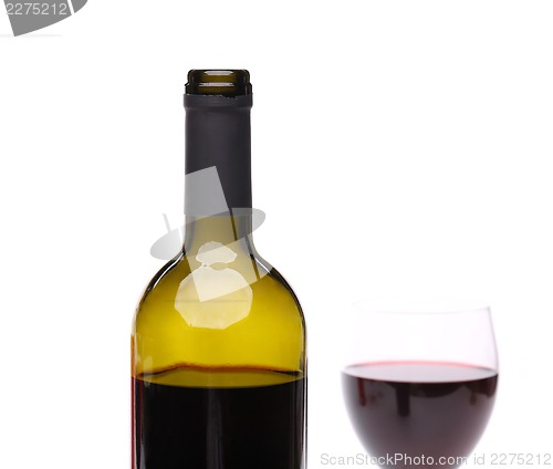 Image of A bottle of red wine with a wine glass.