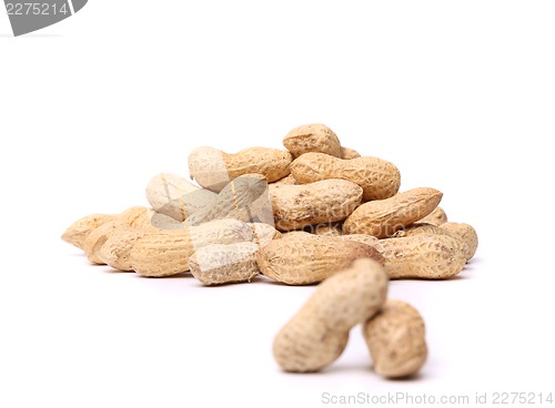 Image of A handful of peanuts for two pods