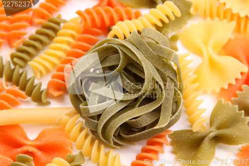 Image of Green tagliatelle paglia e fieno on the backgroun of different pastas.