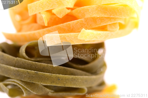 Image of Tagliatelle paglia e fieno homemade tipycal italian pasta close-up.