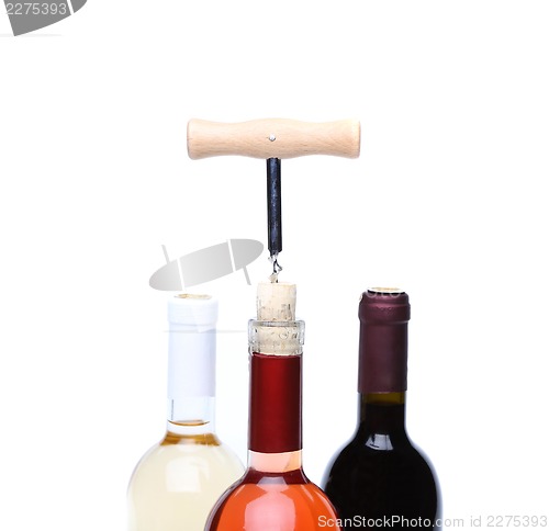 Image of Opening three bottles of wine