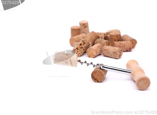 Image of Bunch of wine corks and corkscrew