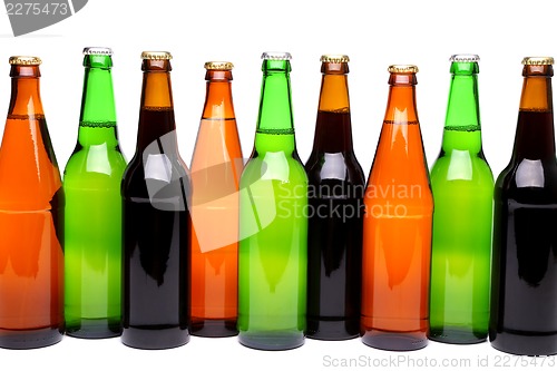 Image of A row of beer bottles.