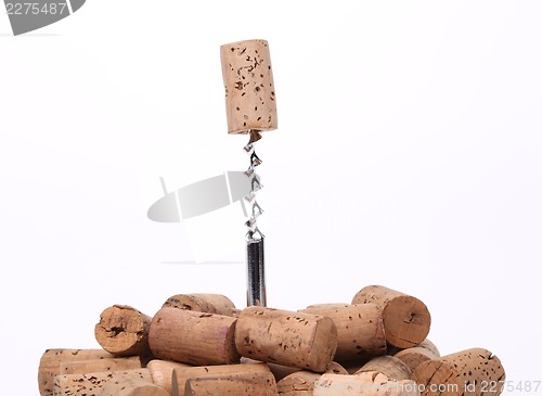 Image of vintage wine corks and corkscrew
