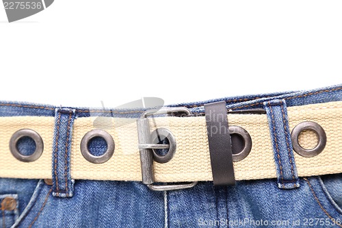 Image of Blue jeans and leather white belt