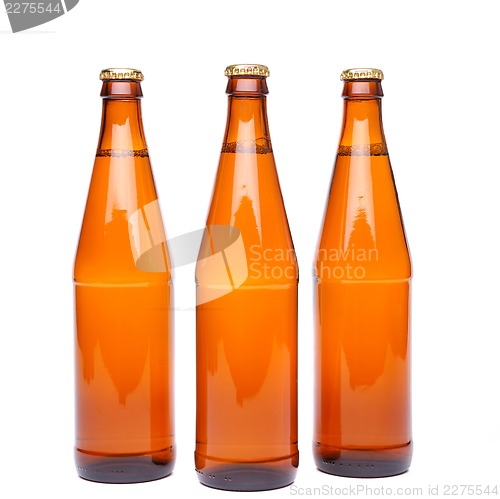 Image of Three brown beer bottle