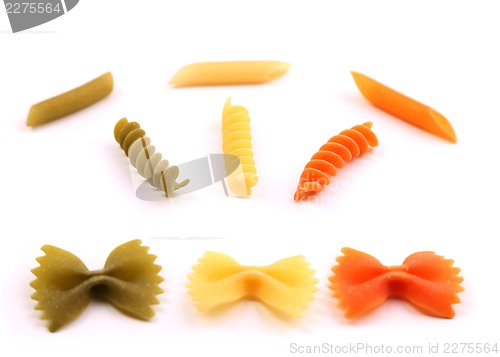 Image of A composition of different pasta in three colors.