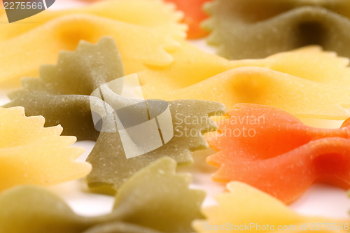 Image of Farfalle pasta three colors close-up.