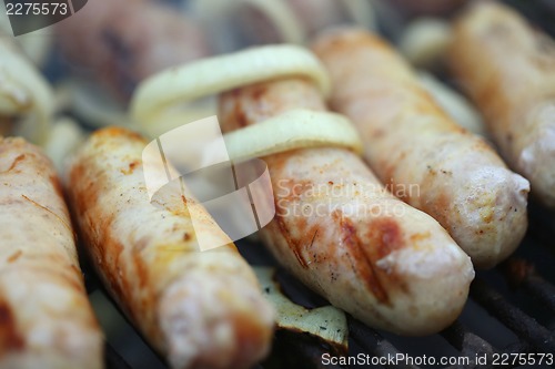 Image of BBQ a few sausages with onion