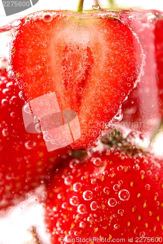 Image of Strawberries with bubbles in water
