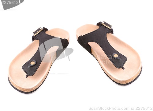 Image of Pair of striped flip-flop sandals isolated on white