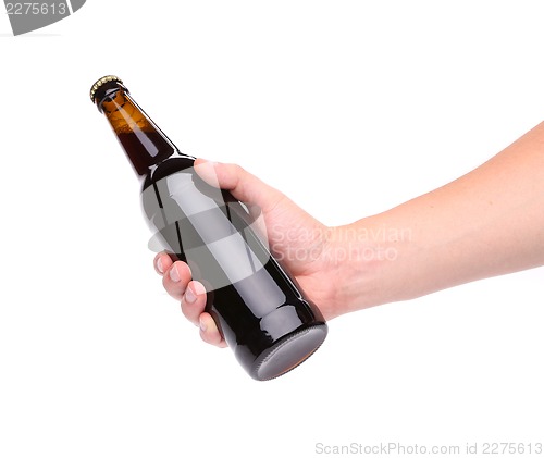 Image of A bottle of beer in a hand