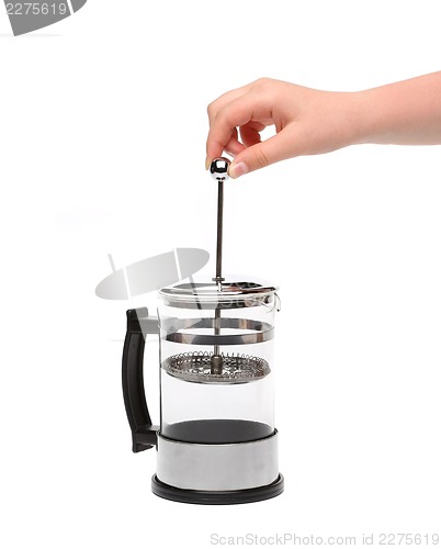 Image of French Press Coffee or Teapot with a Hand