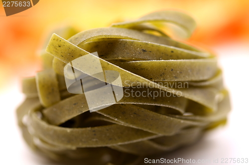 Image of Tagliatelle paglia e fieno homemade tipycal italian pasta close-up.