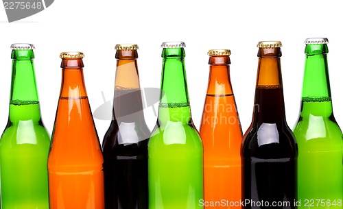 Image of A row of top beer bottles