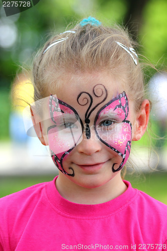 Image of cute little girl with makeup
