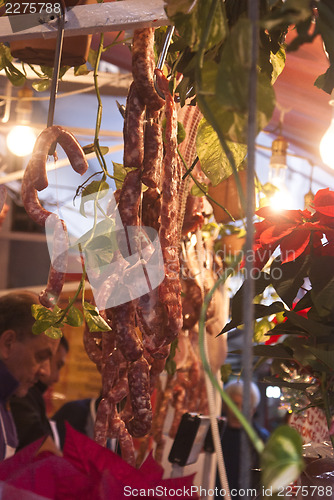 Image of butcher sells meat on the local market