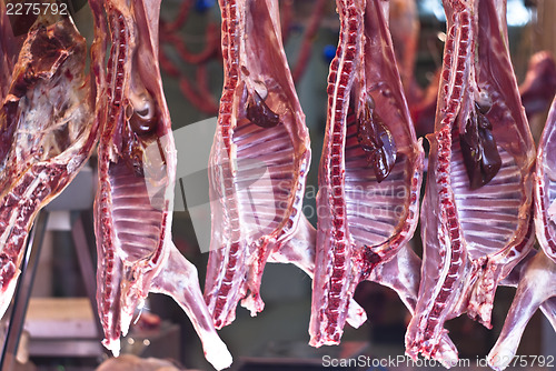 Image of Raw meat in a carnage at the market