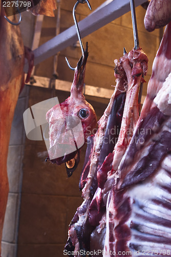 Image of Raw meat in a carnage at the market