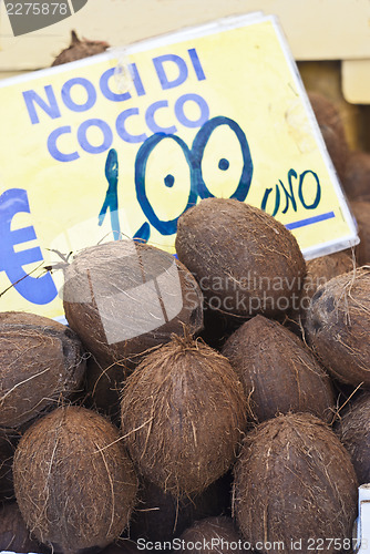 Image of fresh coconuts at local market