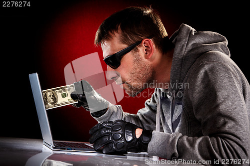 Image of Hacker with laptop