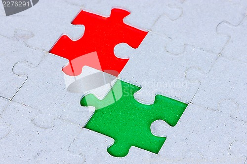 Image of Puzzle with a green and red gap