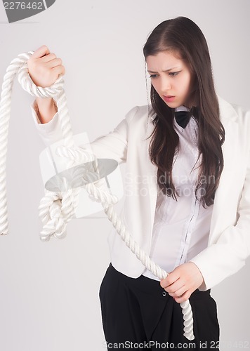 Image of business woman with knot of "problem"