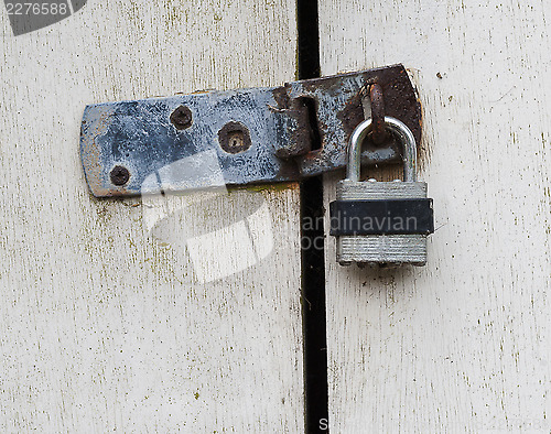 Image of padlock on door