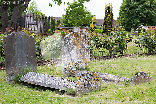 Image of Old weathered tombs in graveyard