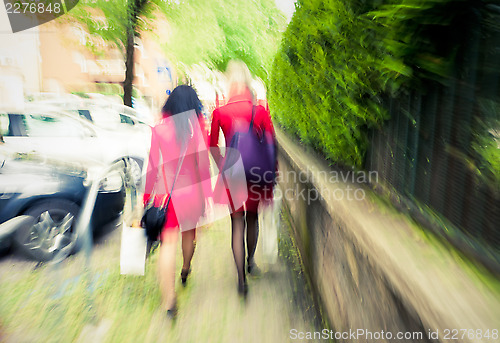 Image of City women in red