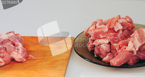 Image of cook,  cut meat