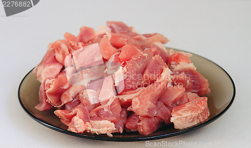 Image of cook,  cut meat