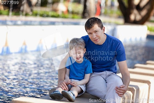 Image of family of two outdoors