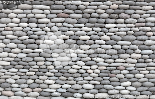 Image of Background - wall decorated with smooth stones