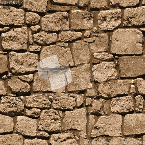 Image of Large rough natural stone wall - seamless texture for design